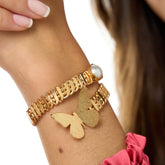 Brazalete Aro Trenzado Mariposa Perla Dorado
