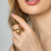 Anillo Esfera Giratoria Dorado