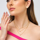 Collar Triple Cadenas con Perla Dorada - Bambú Rosa Joyas y Accesorios