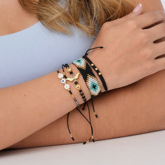 Set De Pulseras X4 Ojo Turco Negras Esencial