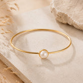 Brazalete Aro Perla Dorado Aura - Bambú Rosa Joyas y Accesorios