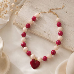 Maxi Collar Piedras Corazón Vino Aura - Bambú Rosa Joyas y Accesorios