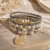 Set Pulseras Dijes surtidos X 7 Plateado Aura - Bambú Rosa Joyas y Accesorios