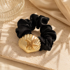 Hair Clip Negro con Concha y Estrella Dorado Aura
