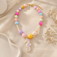 Maxi Collar Dije Caballo de Mar con Piedras Multicolor Dorado Aura