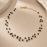 Collar Invisible Cristal Negro Entorchado Dorado Amaré