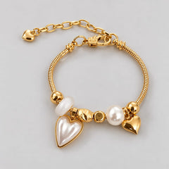 Pulsera Pandora con Dijes en Corazón Y Perla Dorada Creer