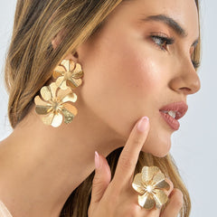 Aretes Doble Flor Pistilos Dorada - Bambú Rosa Joyas y Accesorios