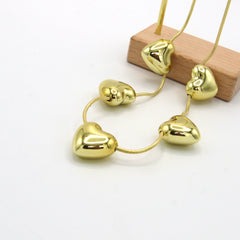 Collar Corazones Esencial Dorado