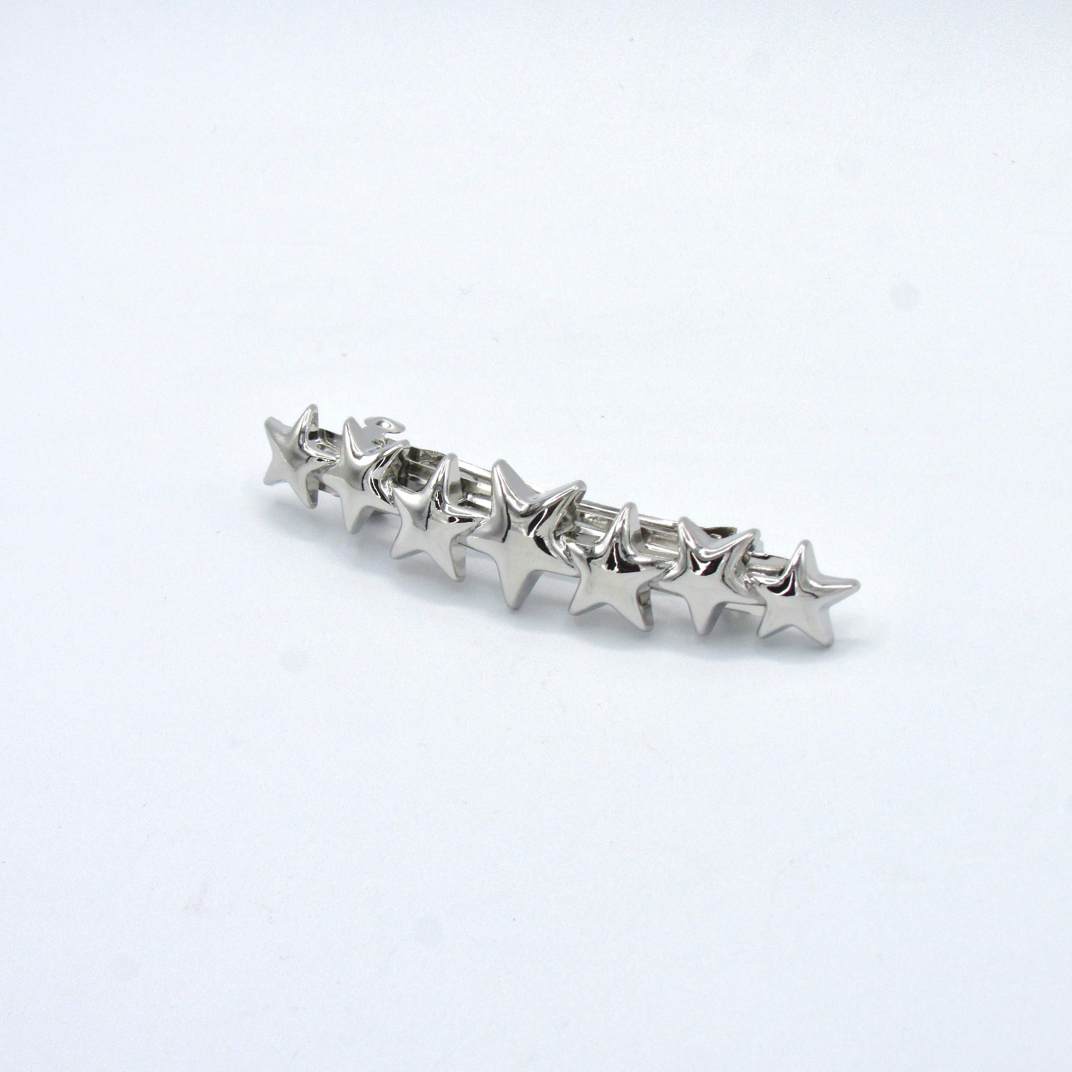 Pinza Estrellas Plateadas