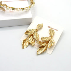 Set Aretes y Diadema Hojas Doradas