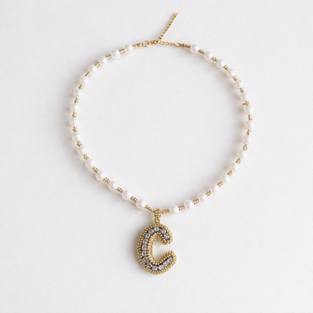 Collar Inicial tejida dorado - Bambú Rosa Joyas y Accesorios 