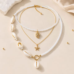 Collar Triple Concha y Dijes de Mar Dorado Aura