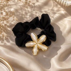 Hair Clip Negro con Flor Dorado Aura
