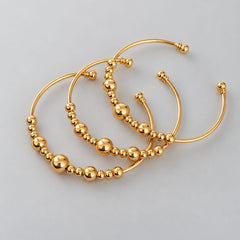 Set x 3 pulseras Balines en Dorado Creer