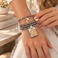 Set Pulseras x 7 Dije San Benito Plateada Tejida Creer